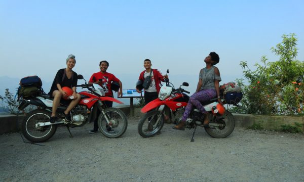 Four people on motorbikes.