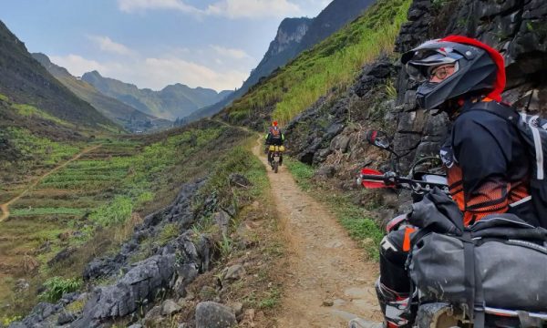 Motorbike trail under a big mountain.