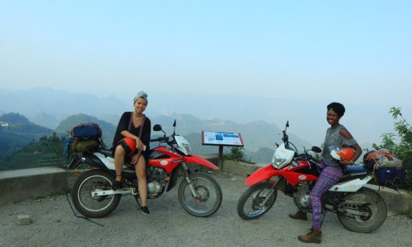 Two girls on motorbike in Ha Giang.