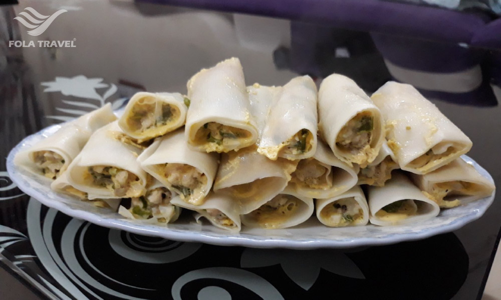 A plate of bamboo egg rolls.