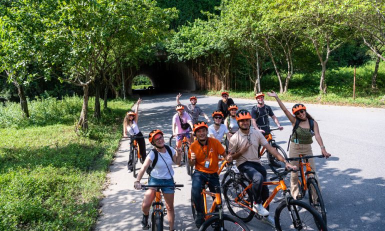 Cozy guests enjoying bicycle tour in Ninh Binh.