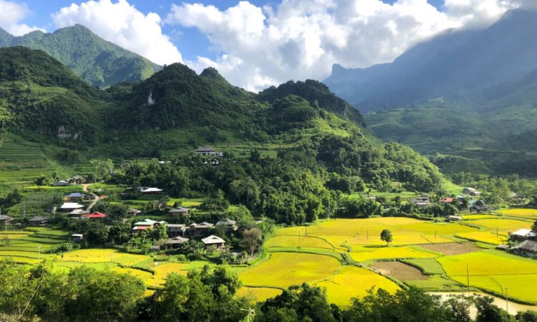 Du Gia village panorama with mountains and rice field.