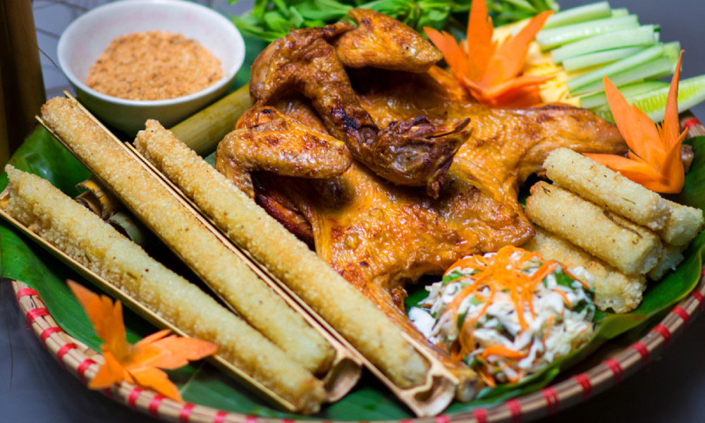 A plate of Sapa bamboo rice and chicken.