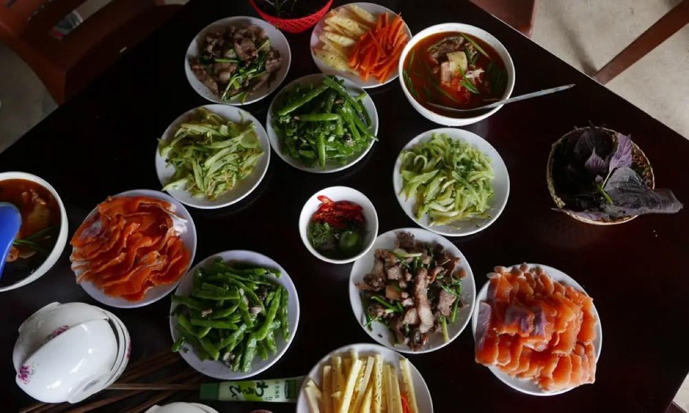 A table full of Vietnamese dishes.