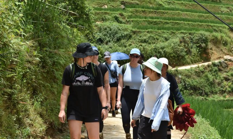 Guests trakking among the terraces.