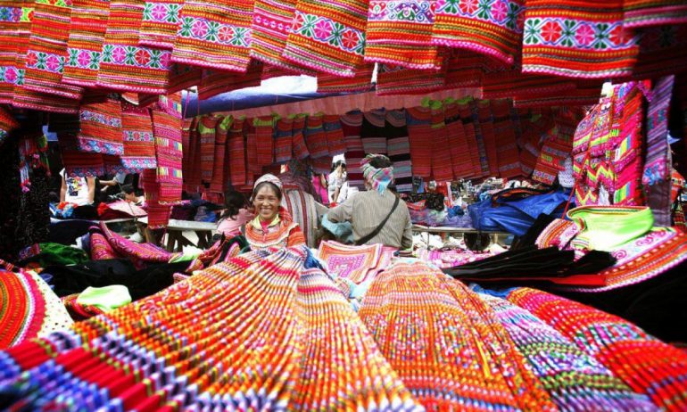 Colorful textiles in a Sapa market.