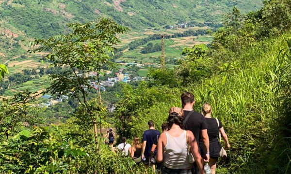 People in Ha Giang trekking down the valley.