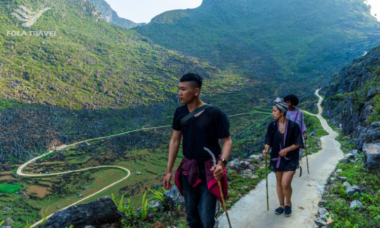 People trekking in the middle of Ha Giang.