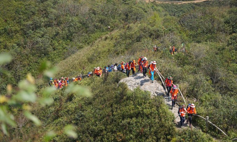 People trekking on Fansipan mountain.