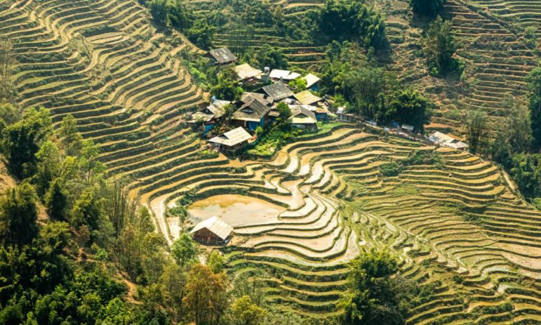 Panorama of Sapa fields and houses from above.