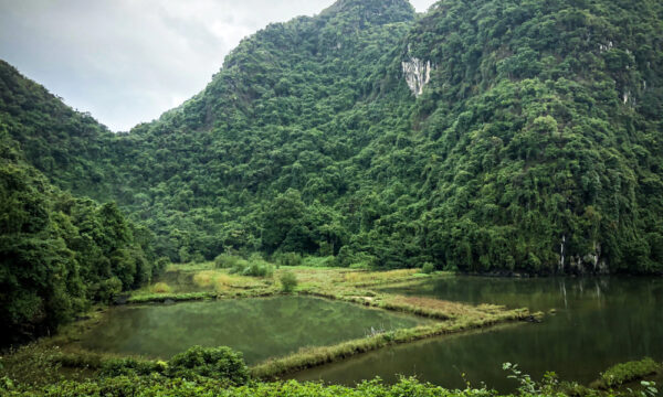 A pond under mountains.
