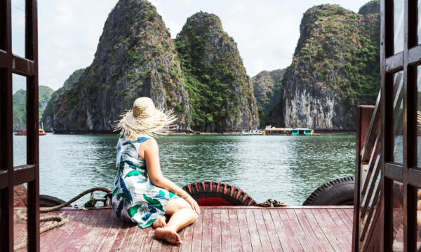 A women sitting looking out to Cat Ba islands.