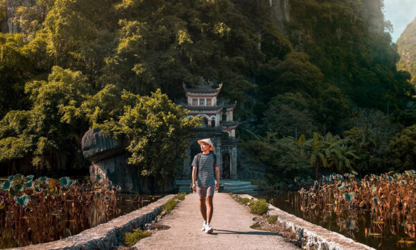 Guest in front of Bich Dong pagoda.