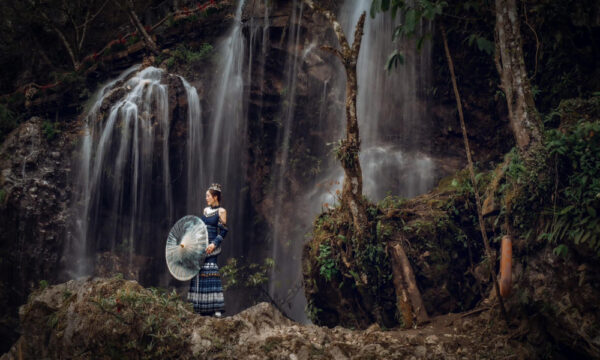 Guest taking cinametic photos at Cat Cat Village waterfall.