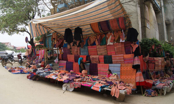 Colorful brocade stall in Bac Ha Market.