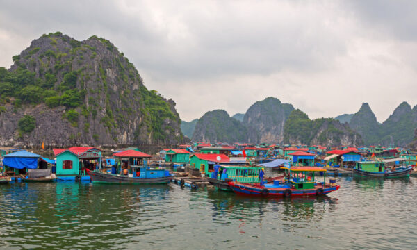 Colorful floating houses of Cua Van Fishing Village.