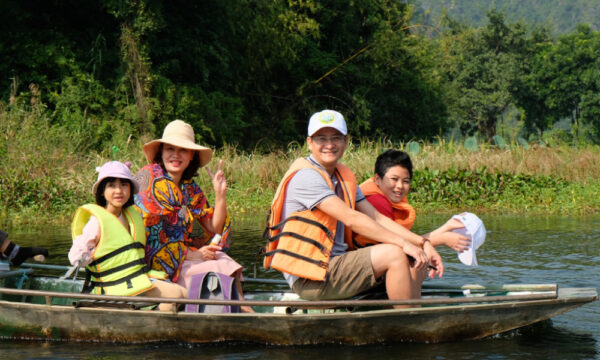 Family boat ride in Tam Coc, Ninh Binh.