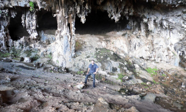 Visitor inside Trinh Nu Cave.