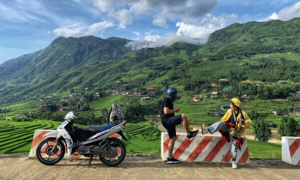 Guests in front of a village in Sapa.