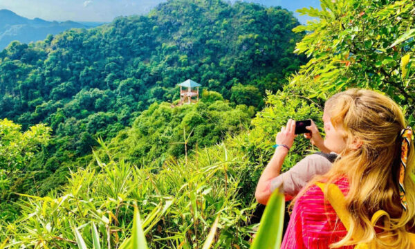 Guests taking picture of Cat Ba mountains.