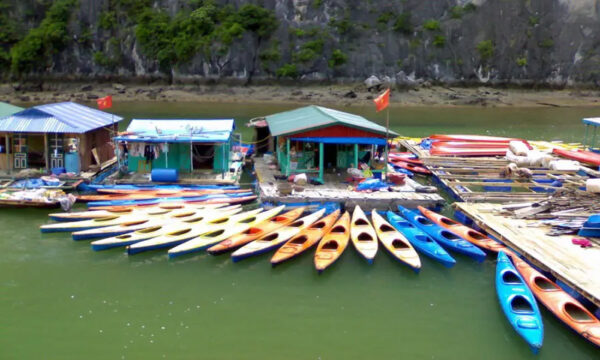 Rental kayaks in a Ba Hang Fishing Village house.