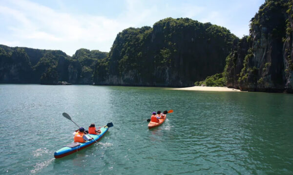 Kayaks heading to a beach in Frog Lagoon.
