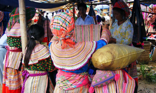 Local people in colorful costumes in Bac Ha Market.