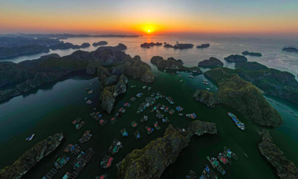 Sunset view over Cai Beo Fishing Village.