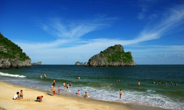 Guests swimming on Van Boi Beach.