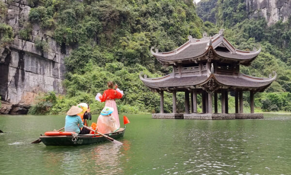 Taking picture in front of Trang An Temple.