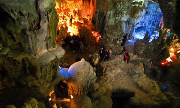 People sightsee inside Thien Cung Cave.