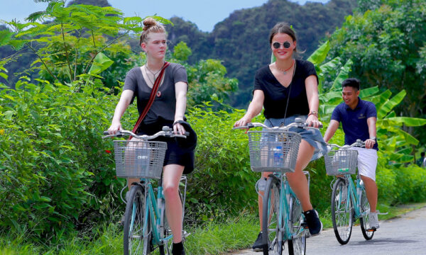 Guests cycling in Viet Hai Village.