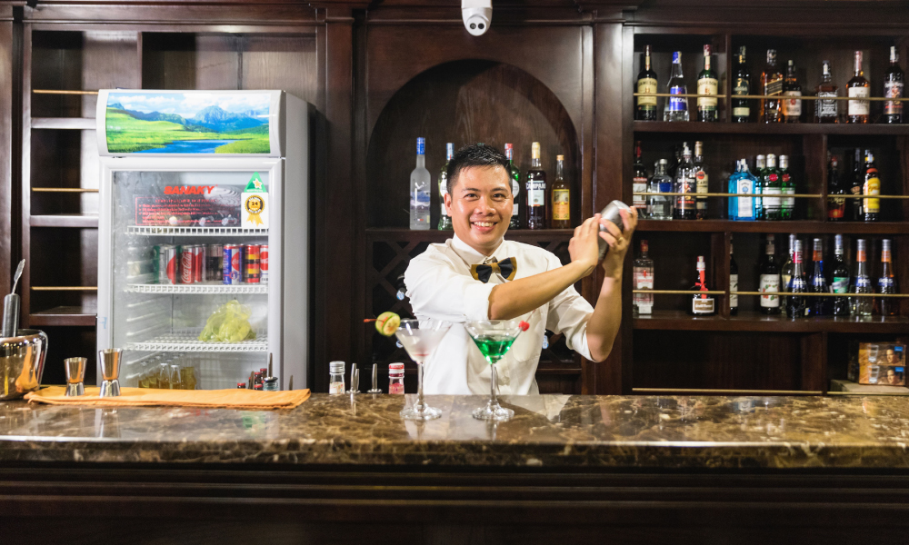 Bartender making drinks on V'Spirit Cruise.