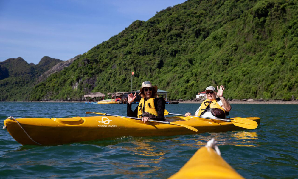 V'Spirit Cruise visitors kayak in the bay.