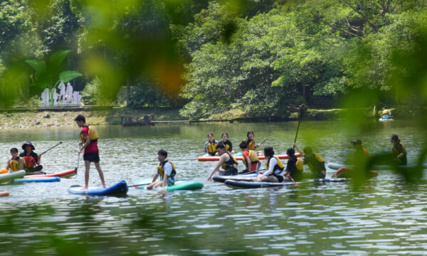 Cuc Phuong guests kayaking on the lake.